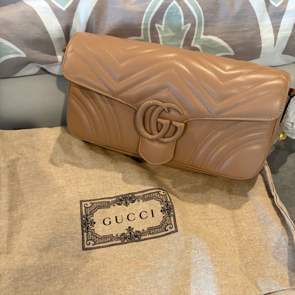 Gucci Tan Leather Clutch with Iconic GG Logo